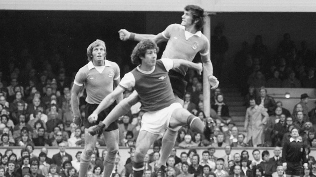 ACTION MAN: Brian, during his time at Arsenal, challenges City's Dave Watson in a game in 1975