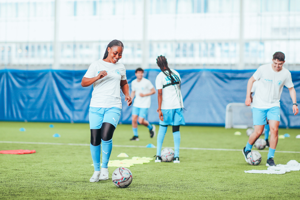 ON-PITCH: : Young Leaders take part in a WASH curriculum football session with City coaches 