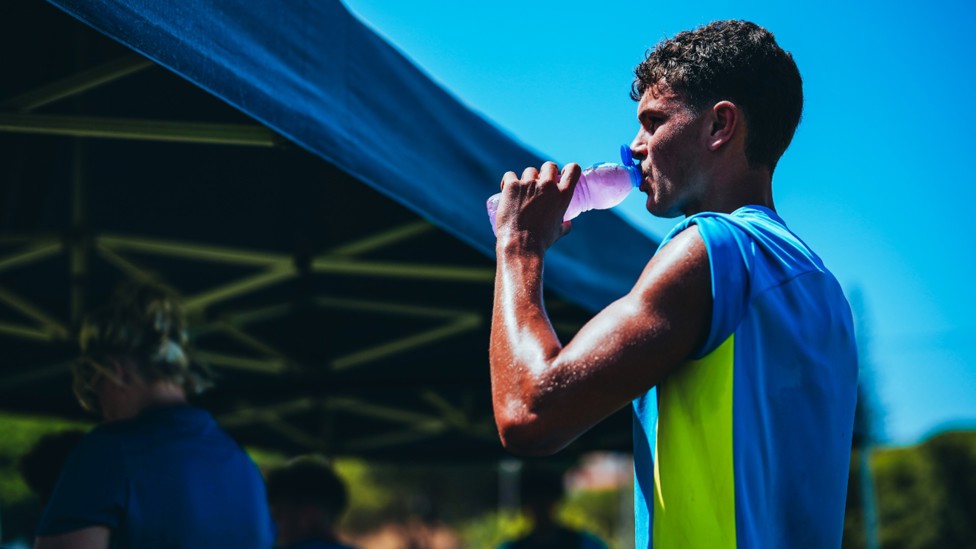 THIRSTY WORK: Harrison Parker grabs a quick refreshment break.