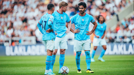 THREE AMIGOS: Foden, KDB and Gundogan discuss a set-piece.