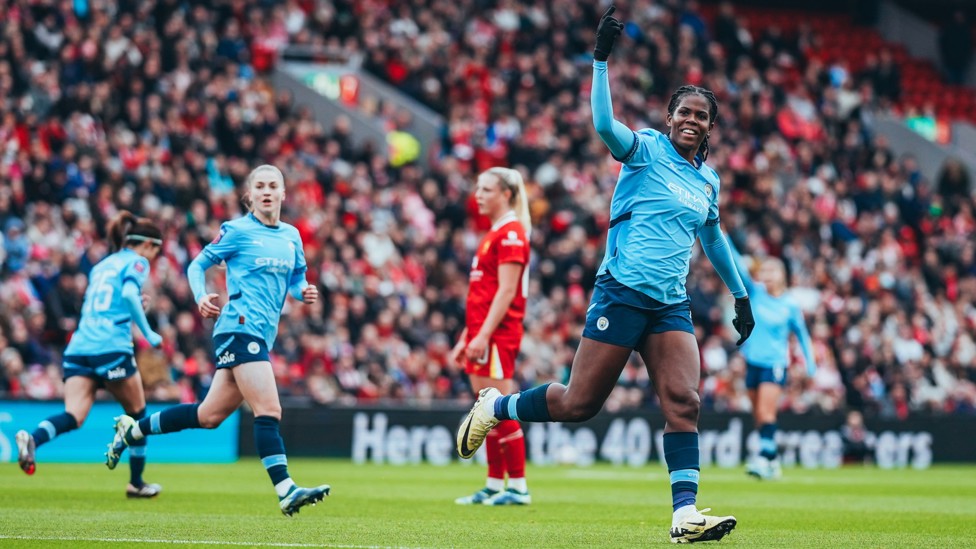 STAR POWER : Khadija ‘Bunny’ Shaw wheels away as she ensures a 2-1 win over Liverpool at Anfield.