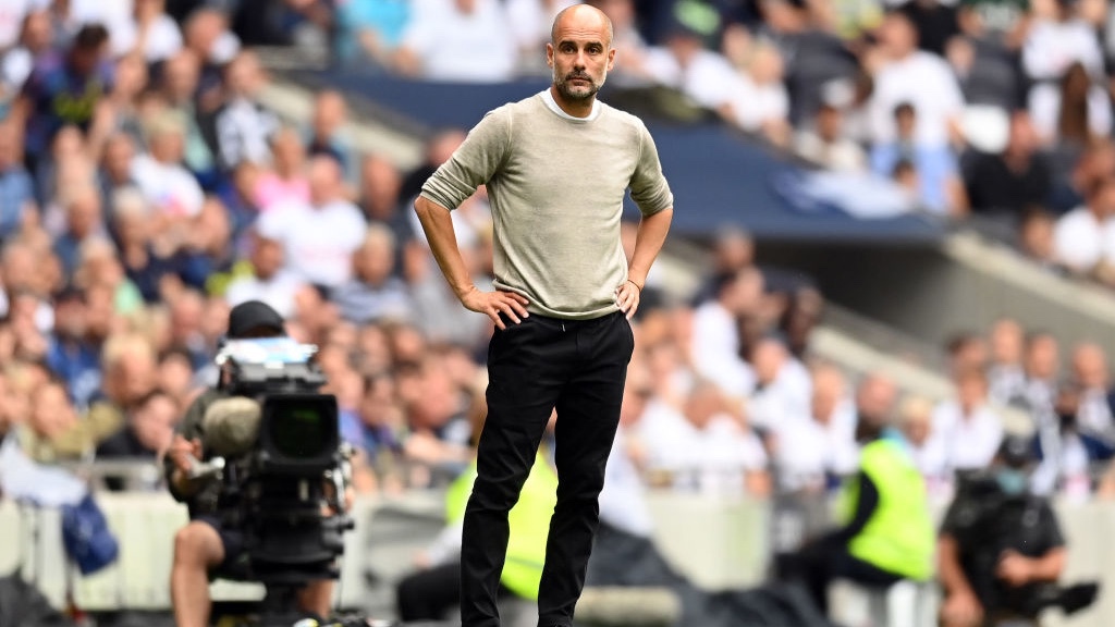 
                        WATCHING BRIEF: Pep Guardiola looks on
                