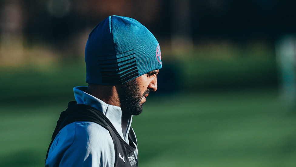 Riyad keeps  warm in the frosty surrounds...