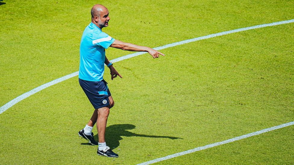 PEP'S POINTER: The boss hands out more crucial advice to the squad