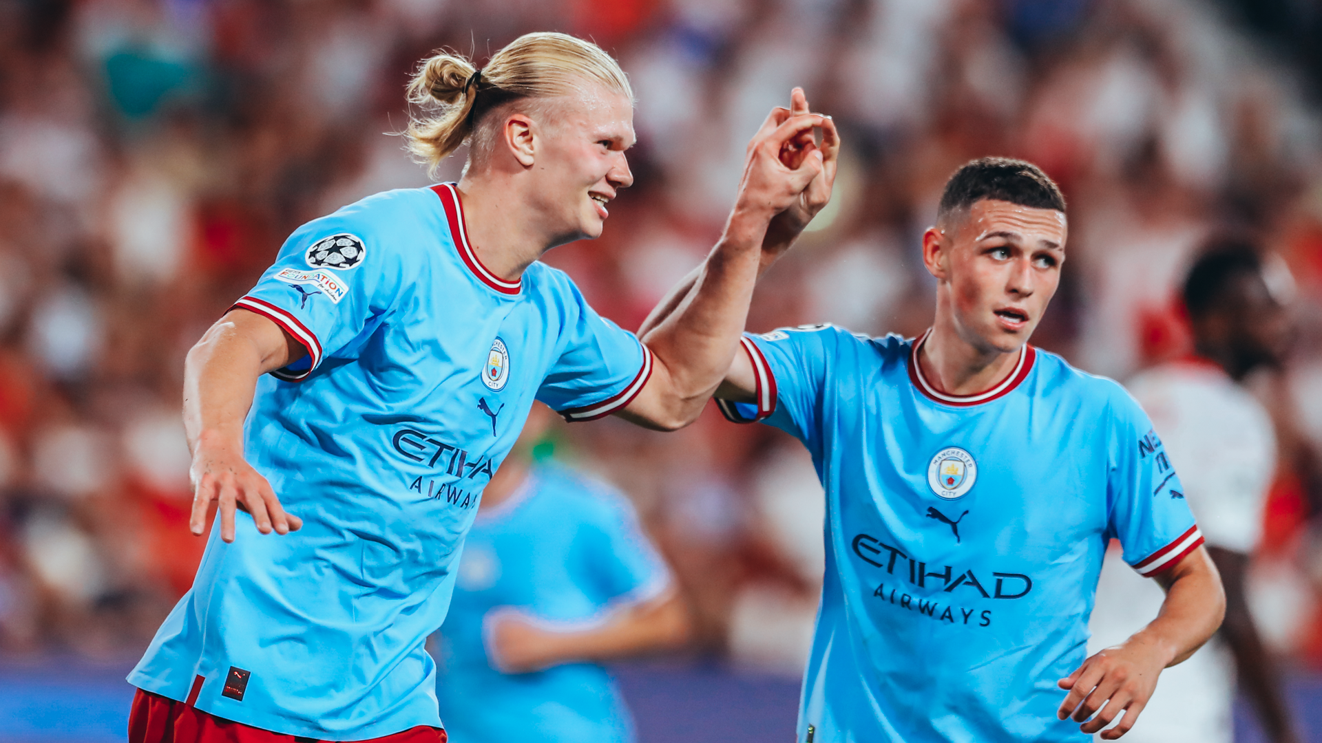 TARGET MAN : Erling Haaland celebrates his second goal with fellow scorer Phil Foden