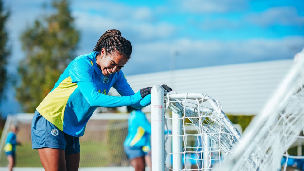 WORKING HARD : Mary Fowler pushes a goal into position. 