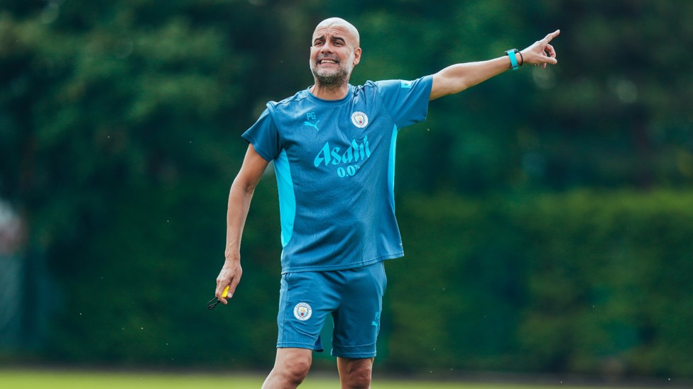 FOLLOW THE LEADER : Pep Guardiola points the way for his players