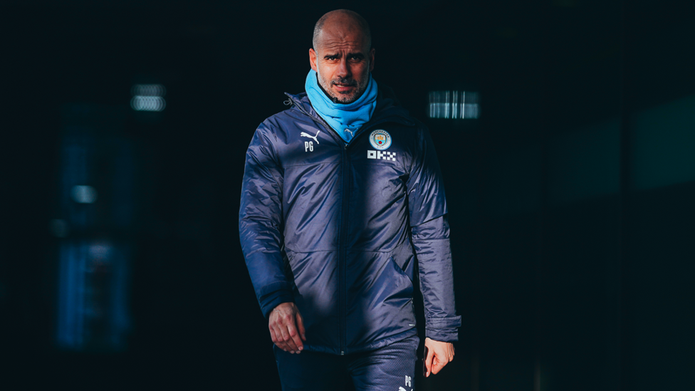 THE BOSS: Pep Guardiola steps out ahead of Tuesday's session