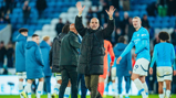 THE BOSS: Applauds the travelling fans.