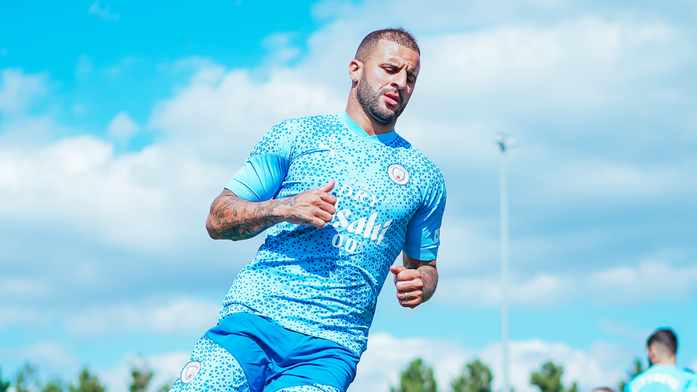 WALKER WARM-UP : Kyle Walker limbers up before the session.