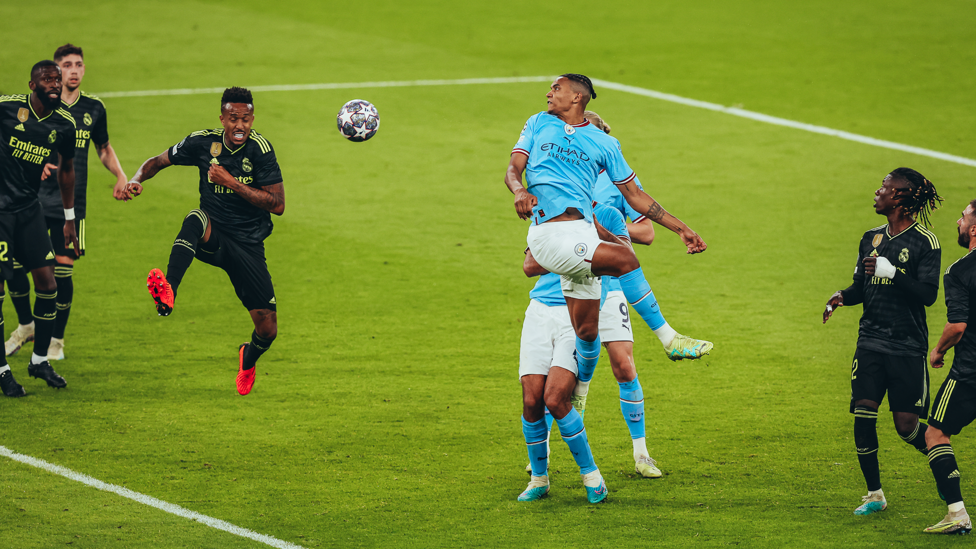 MAKE THAT THREE : Akanji's header deflects off Militao and into the net!