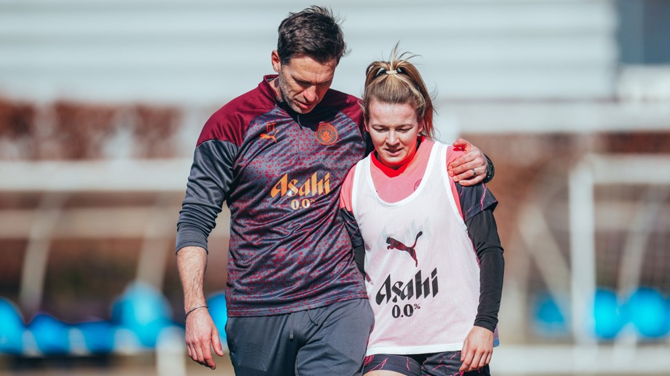 TEAM SPIRIT : Gareth Taylor and Lauren Hemp head out onto the training pitch.