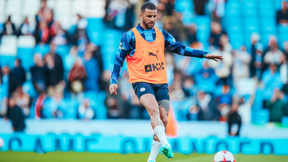 KICKING KYLE : Our flying full-back gets in the mood during the pre-match warm up.