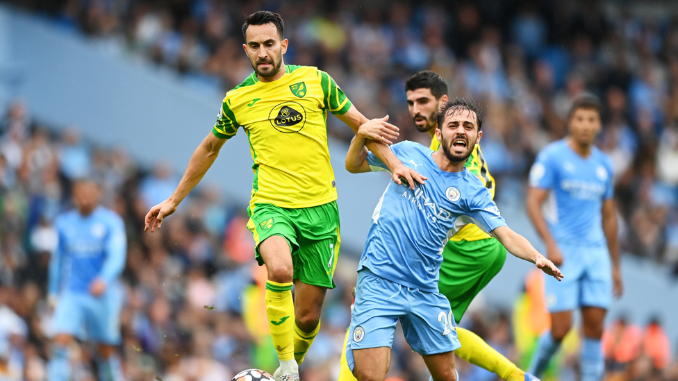 TANGLED : Bernardo Silva and Lukas Rupp tangle as they contest for the ball. 