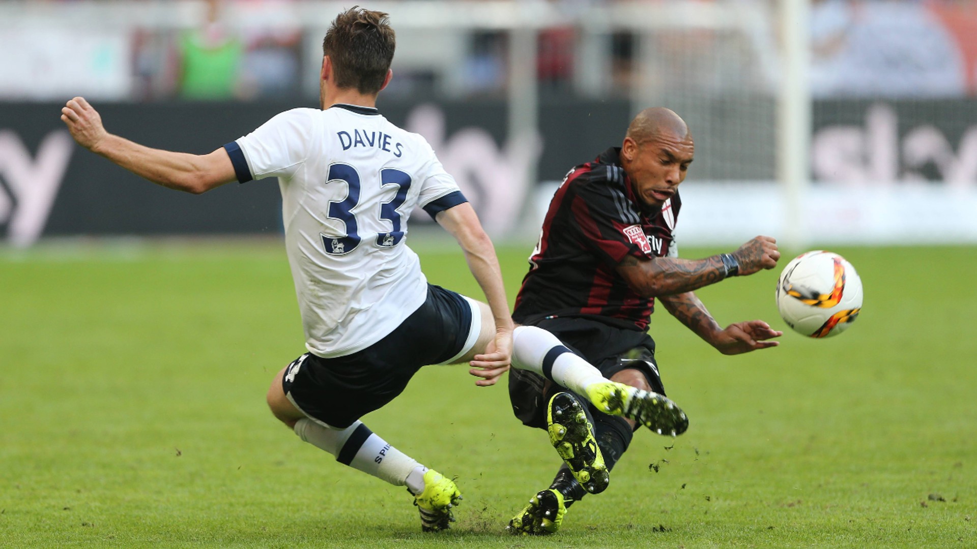 ACTION MAN: Nigel De Jong at full throttle for AC Milan.