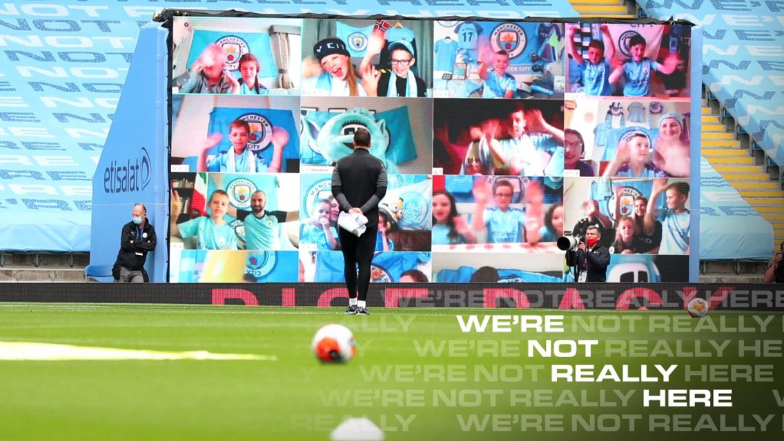 Competition winners take over Etihad Stadium fan wall