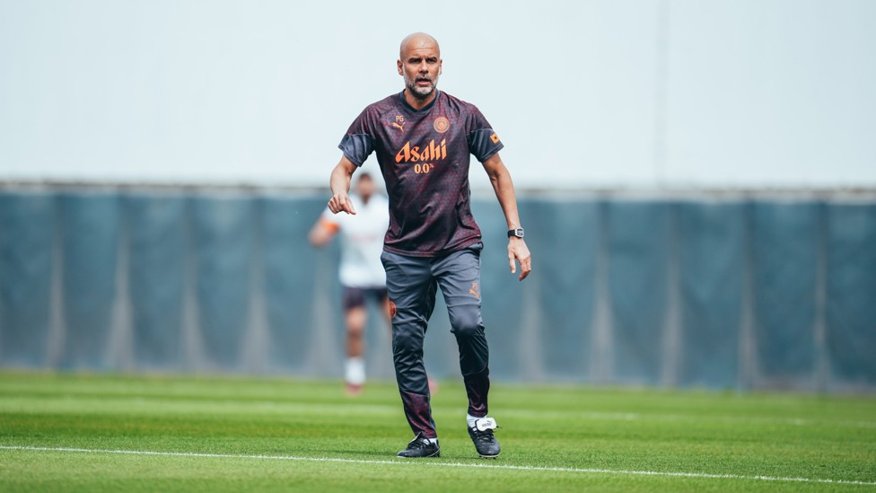 THE BOSS  : Pep Guardiola keeps an eye on proceedings. 