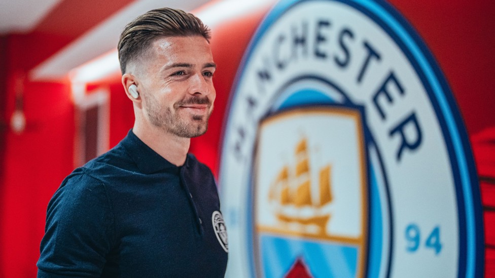 GRINNING GREALISH : In great mood when arriving for the game.