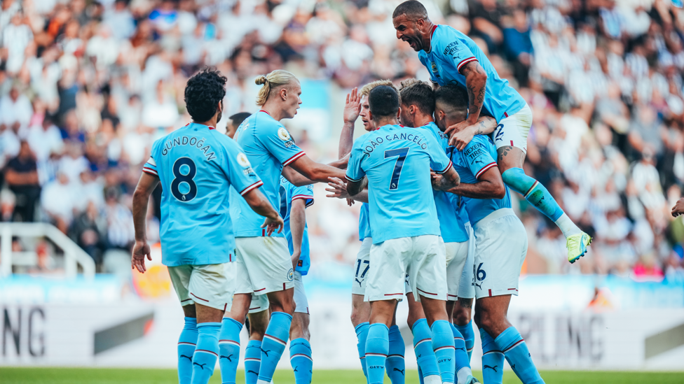 TOGETHER : The players celebrate after the equaliser.