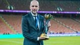 HAPPY PEP: Poses with the trophy.