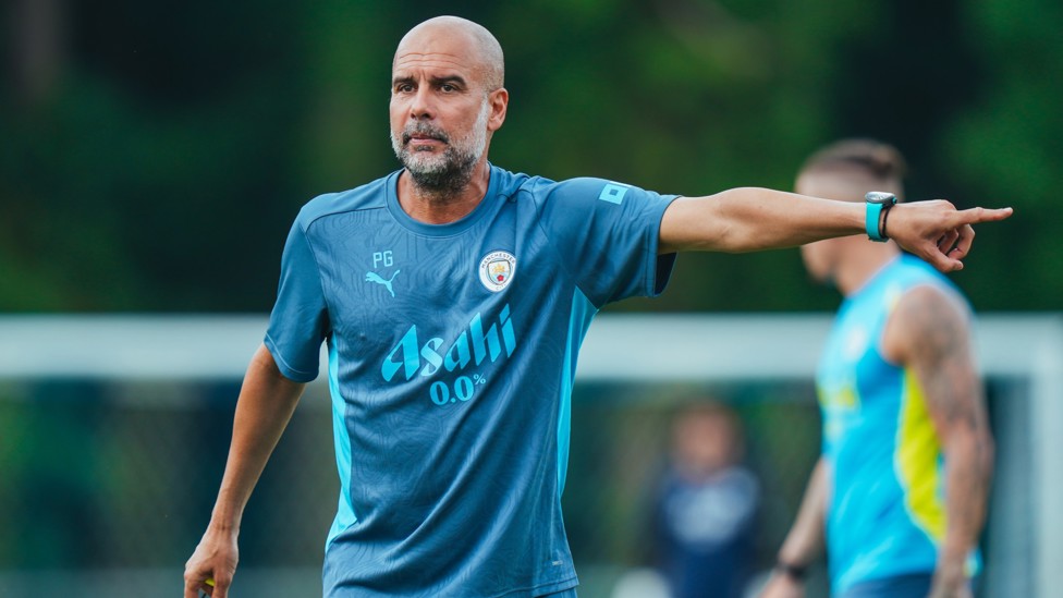 BOSSING IT : Pep Guardiola dishes out some instructions