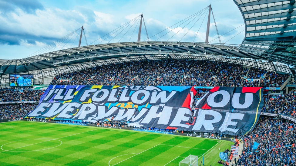 PICTURE PERFECT: Pre-match banner revealed as the players enter the pitch