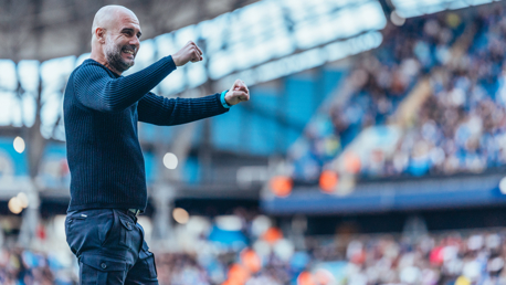 THE BOSS: Celebrates on the touchline.