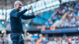 THE BOSS: Celebrates on the touchline.