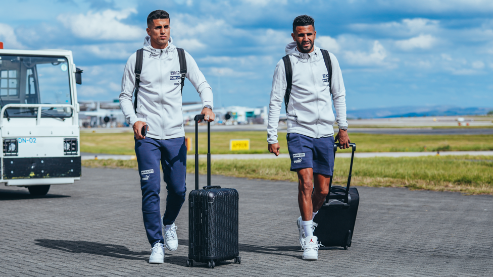 CARRY ON : Cancelo and Mahrez keep their luggage close at the airport