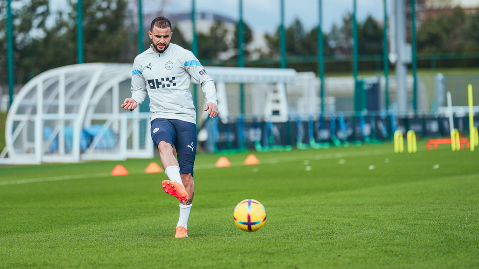 BY THE RIGHT: Kyle Walker fizzes in a low pass.