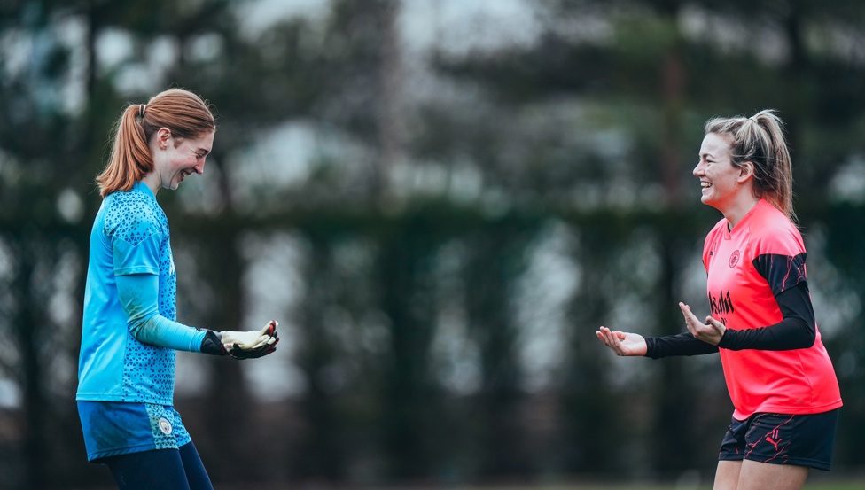 Sandy McIver and Lauren Hemp enjoy a joke