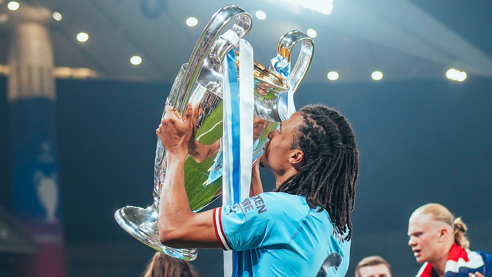 SEALED WITH A KISS: Nathan embraces the Champions League trophy after that magical night in Istanbul