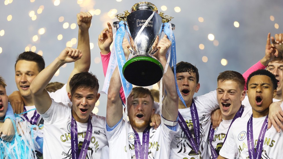  : Tommy Doyle lifts the PL2 trophy