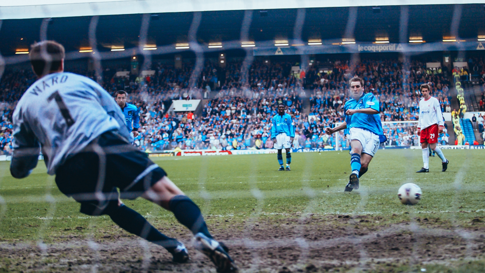 PENALTY : Darren Huckerby completes a hat-trick by sending Nottingham Forest goalkeeper Darren Ward the wrong way from the spot in a 3-0 win | 30 March 2002.