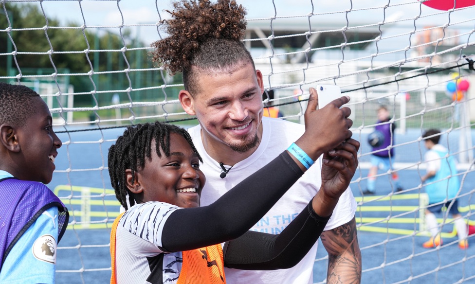 Kalvin Phillips and a young fan take a selfie at the CITC weekend event