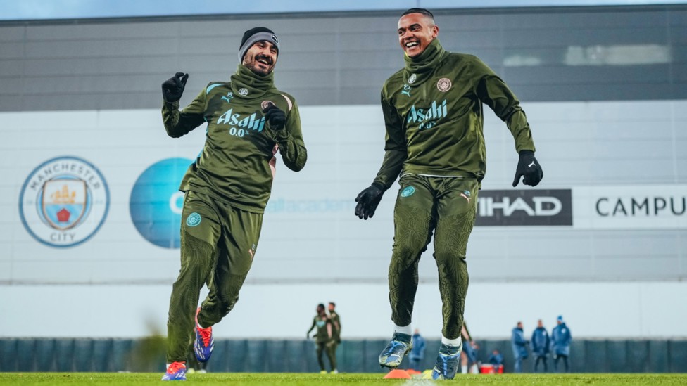 TWO'S COMPANY: Ilkay Gundogan and Manuel Akanji go through the gears.