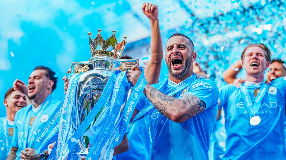 FOUR-IN-A-ROW : Kyle Walker gets his hands on the Premier League trophy