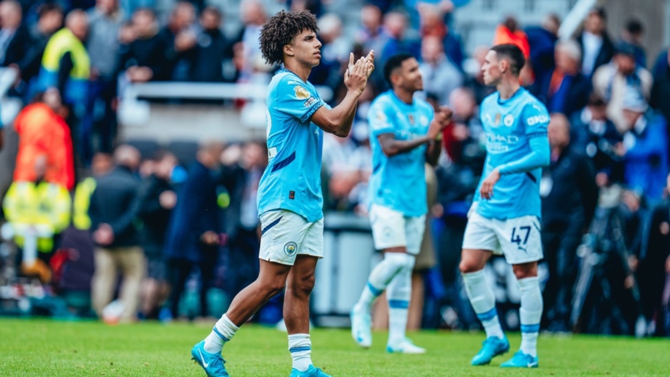 TRAVELLING FANS: Rico Lewis applauds the travelling City fans