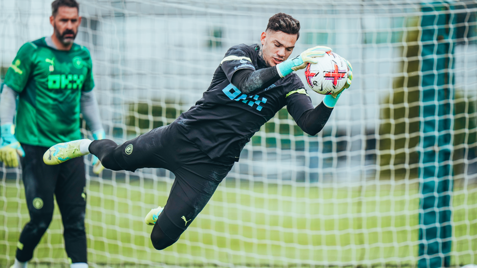 SAFE HANDS : Ederson pictured calmly catching the ball in training.