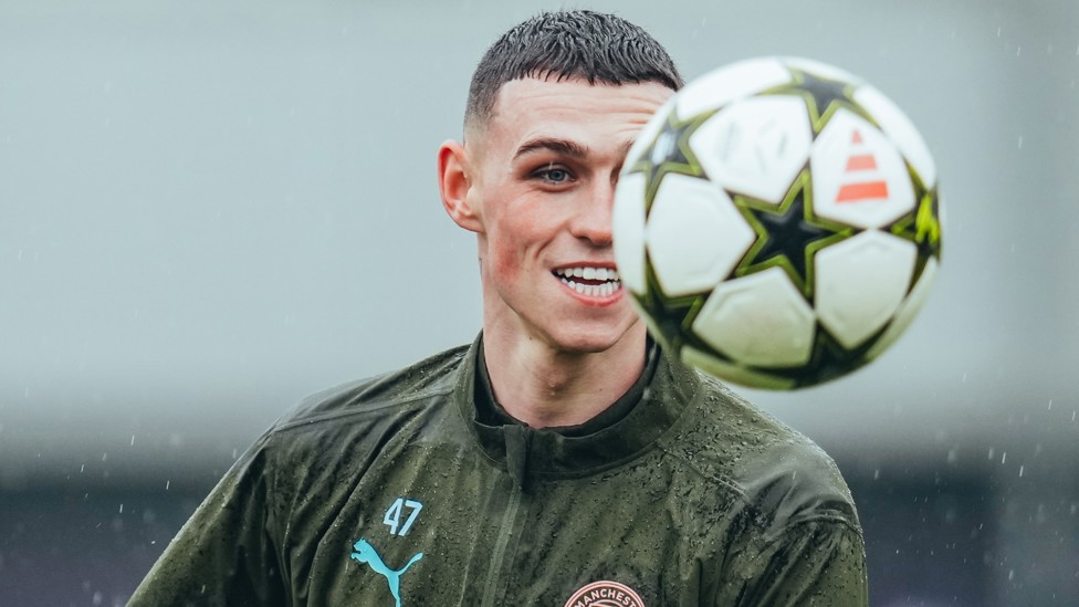 EYES ON THE PRIZE : Phil Foden focused on the ball.