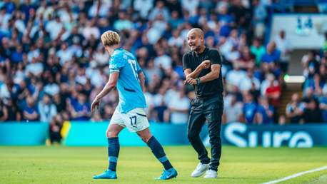 PEP TALK: Passing on instructions from the touchline.