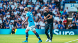 PEP TALK: Passing on instructions from the touchline.