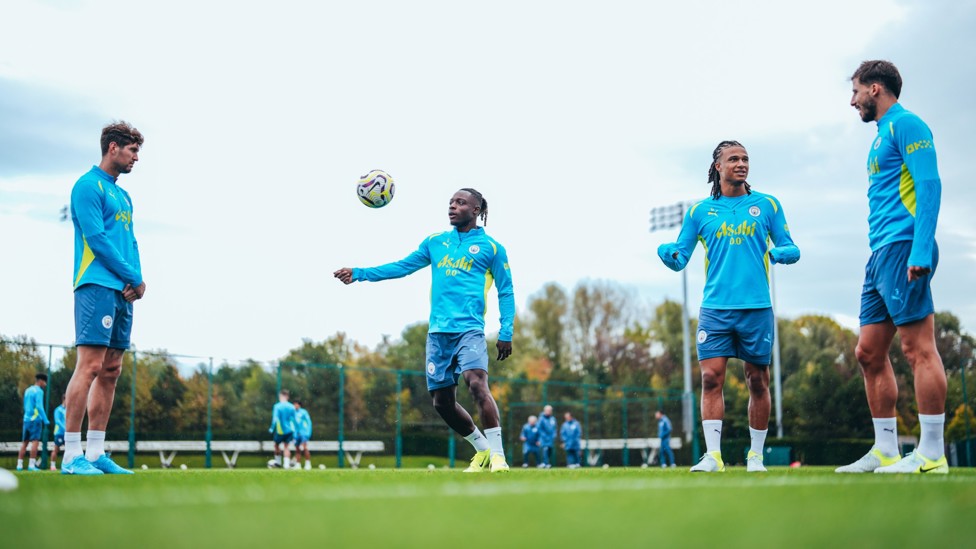 ON THE BALL : The City players warm up