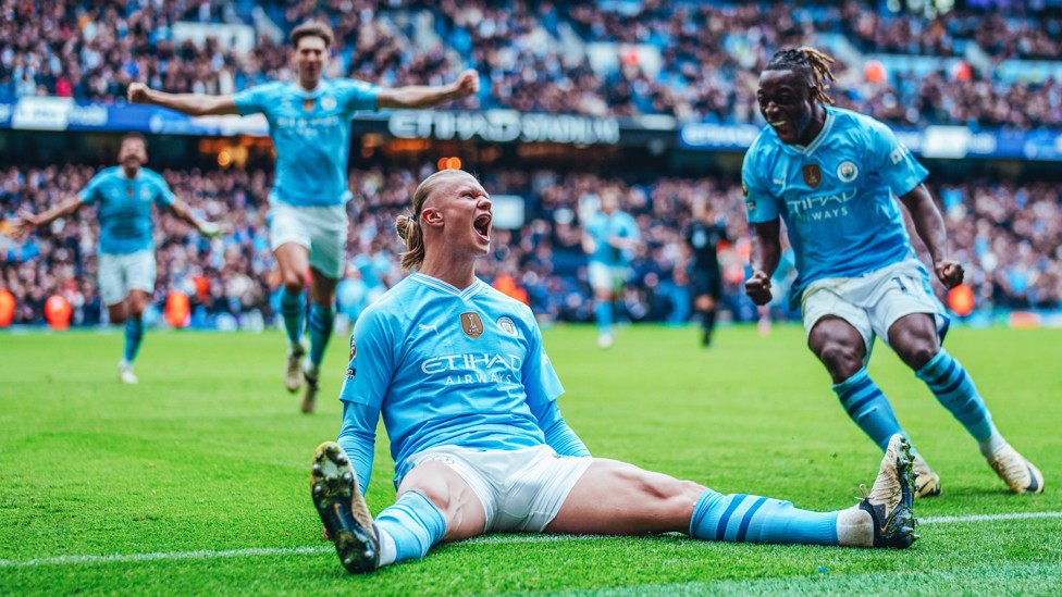 SLIDING TO THREE POINTS : Erling Haaland buzzing after scoring in the 2-0 home win over Everton.