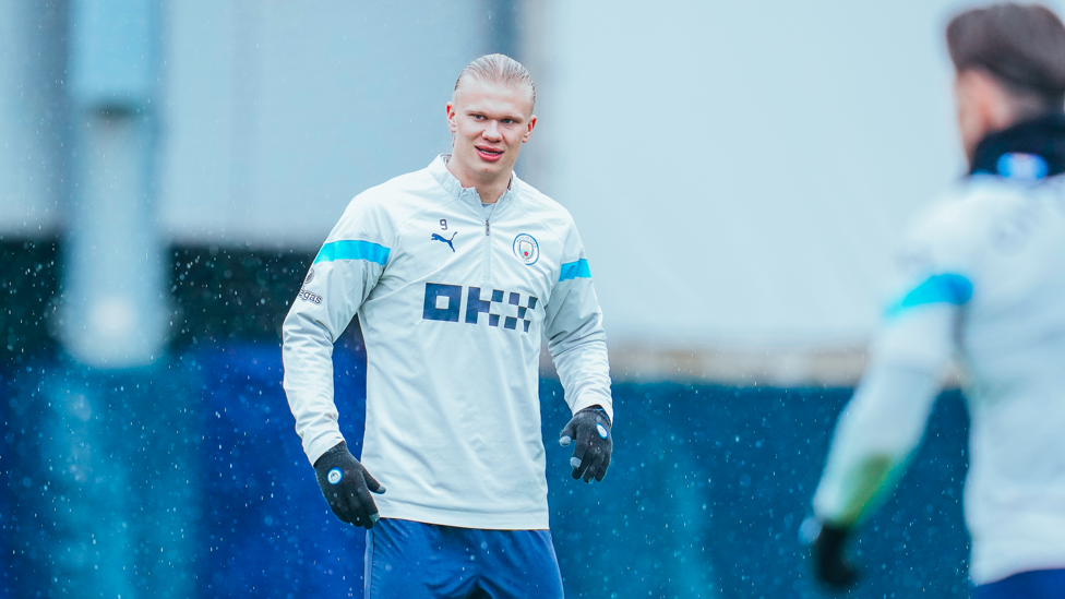 GOAL MACHINE : Erling Haaland keeps an eye on events in training