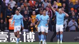 Manchester City's players celebrate after scoring in our victory over Wolves