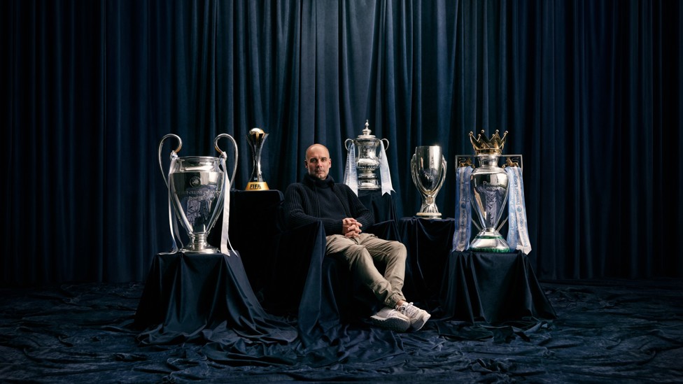 THE BOSS : Pep Guardiola takes part in a photoshoot that celebrates City’s capture of the Big Five major trophies.