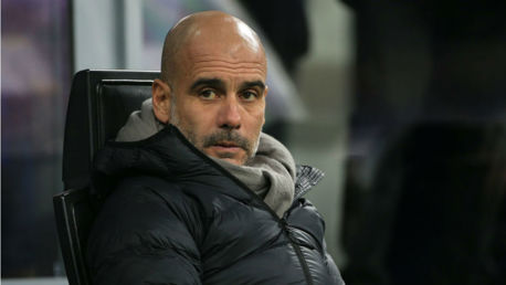 WATCHING BRIEF: Pep Guardiola looks on as the action gets underway at the San Siro