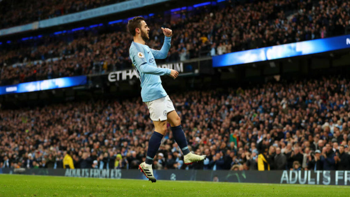 SILVA SHINES: Bernardo celebrates putting City 1-0 with a close-range strike