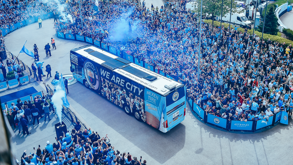 BOISTEROUS BLUES : Fans welcome the team coach to the Etihad Stadium before our title decider with Aston Villa on 22 May